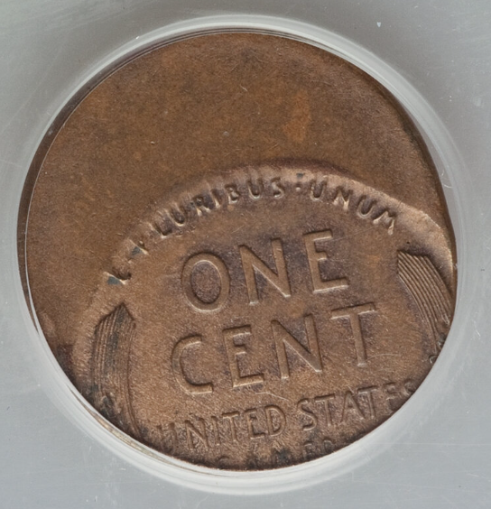 1921 wheat penny off-center strike error showing blank crescent and shifted Lincoln portrait