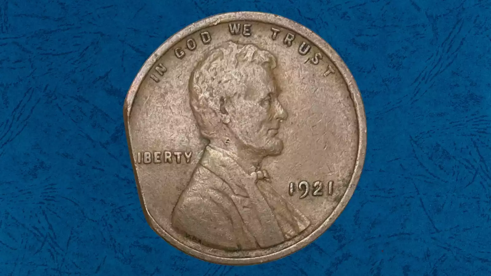 1921 wheat penny clipped planchet error showing crescent-shaped missing section along the coin edge